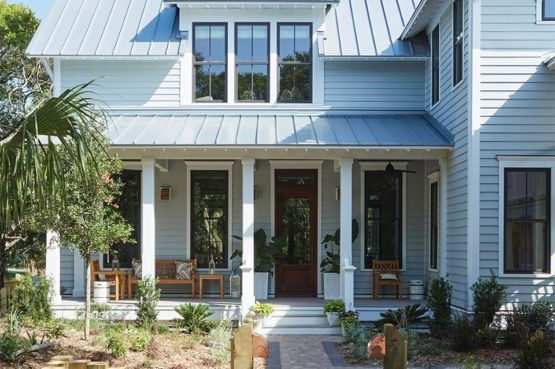 an exterior photo of a two story house with a front porch